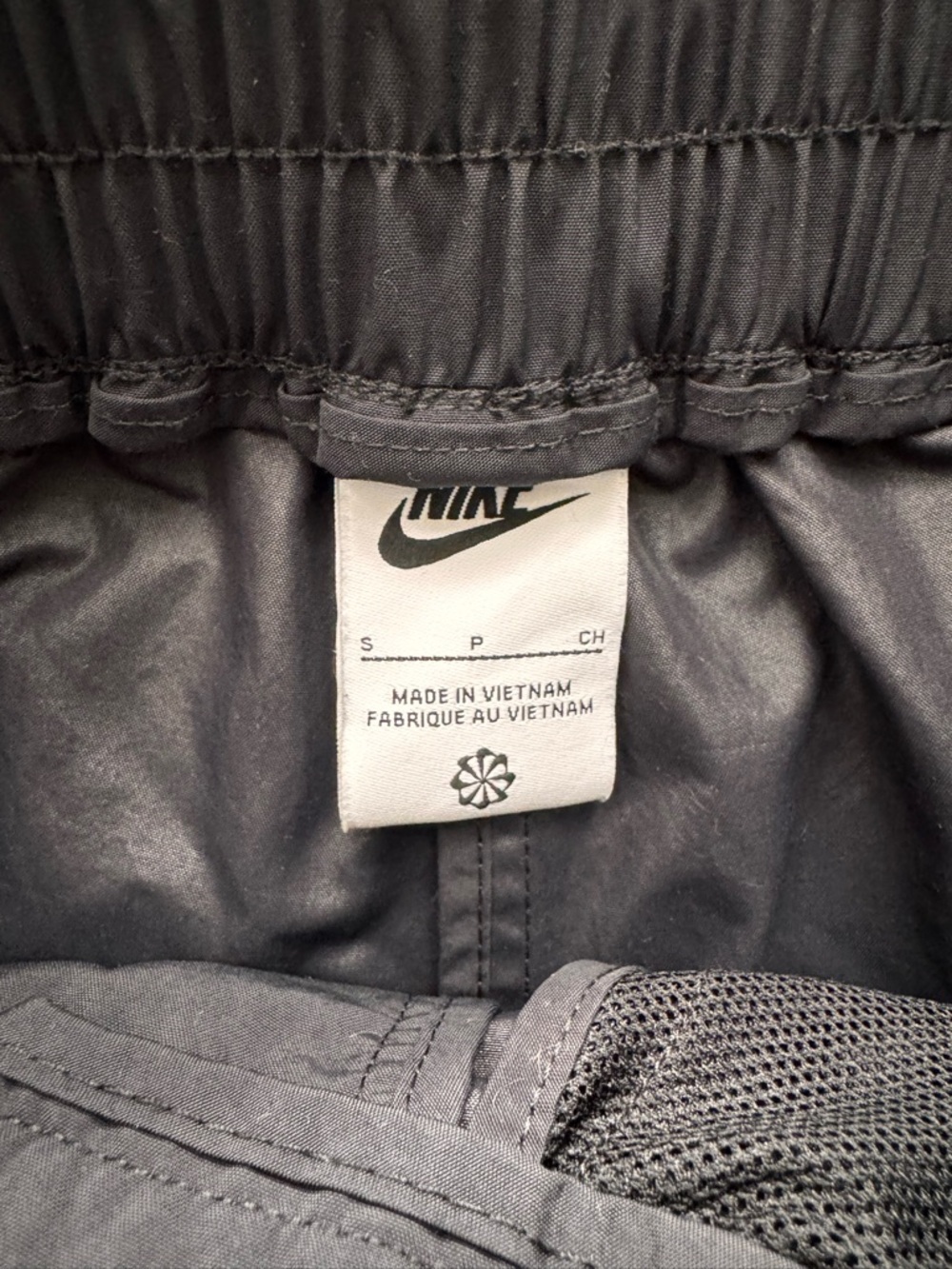 Nike Sportswear Collection Mid-Rise Repel Asymmetrical-Waist Trousers - Picture 7 of 7